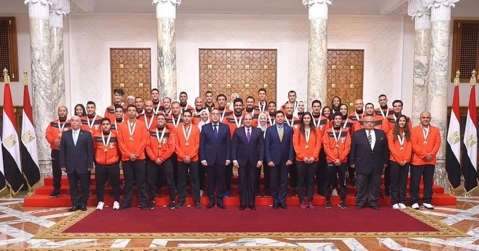 صور| تكريم رئاسي لأبطال الكاراتيه بنادي البنك الأهلي المصري