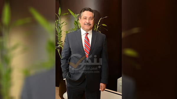 حسن غانم - بنك التعمير والإسكان