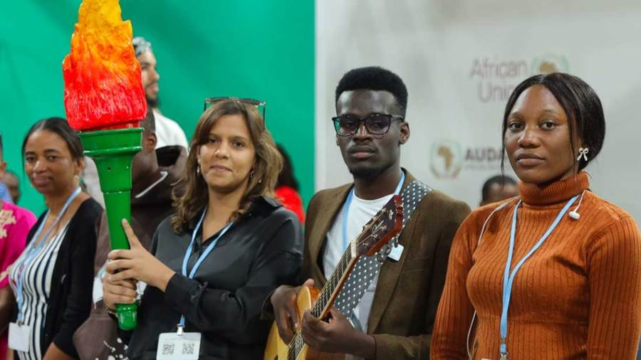 On Africa Day, COP 27, African youth group present a symbolic torch to their leaders as a constant reminder for climate action
