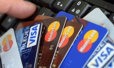 ضبط لص يستولى على بيانات كروت الدفع الالكتروني الخاصة بعملاء البنوك