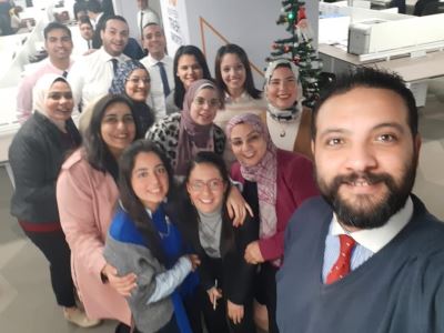 صور| موظفو بنك التنمية الصناعية يحتفلون بالعام الميلادي الجديد