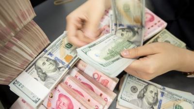 استقرار سعر الدولار في 28 بنكًا بختام تعاملات اليوم الأحد
