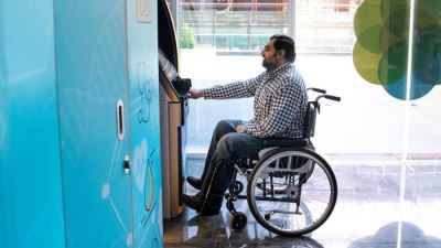 البنك الأهلي يخصص ماكينة صراف آلي لخدمة ذوي الهمم بفرع شبين الكوم