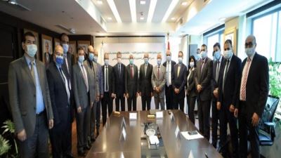 بروتوكول تعاون بين البنك الأهلي والتأمينات لتحصيل اشتراكات العاملين في الخارج