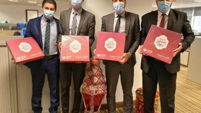 بنك QNB الأهلي يوزع كعك العيد على موظفيه «صور» 