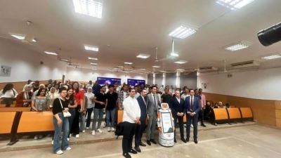 جامعة النهضة تستعرض تجربة الروبوت الآلى الخاصة بالبنك الأهلى المصري