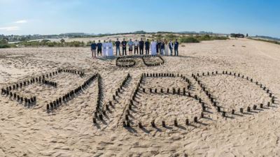 اللجنة التنفيذية لمجموعة بنك الإمارات دبي الوطني تحتفي بالذكرى السنوية الـ60 لتأسيس البنك