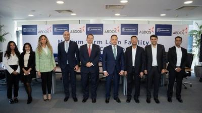 الإمارات دبي الوطني وابدوس اف ام سي جي للصناعة يوقعان على تسهيل قرض متوسط الأجل