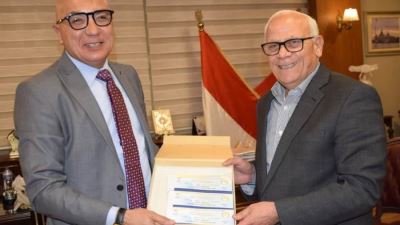 البنك الزراعي يوزيع بونات شراء مواد غذائية على الفئات الأولى بالرعاية بمحافظة بورسعيد