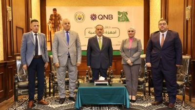 بنك QNB ومحافظ أسيوط يشهدان احتفالية تسليم كراسي متحركة وسماعات طبية للأطفال من ذوي الإعاقة