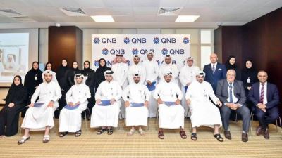 قطر الوطني: تخريج 25 موظفًا في برنامج «أهلًا QNB»