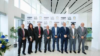 البنك الأهلي المصري يوقع بروتوكول مع مجموعة "أبوغالي موتورز" لتوريد وتسليم سيارات "جيلي" في مصر