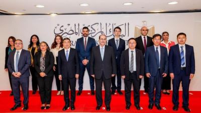 نائب محافظ البنك المركزي  ونائب وزير الإدارة الوطنية الصينية للتنظيم المالي يوقعان مذكرة للتعاون المشترك