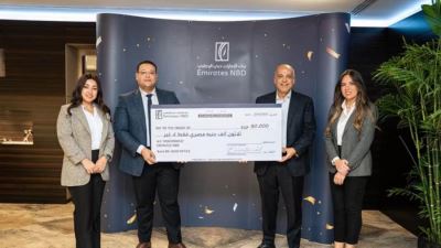بنك الإمارات دبي الوطني يسلم الفائز بمسابقة تحصيل المستندات لشهر ديسمبر جائزتين بقيمة 130 ألف جنيه 